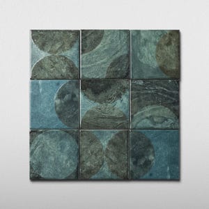 May include: Nine square tiles arranged in a grid, each featuring a semi-circular design. The tiles have a mottled appearance with shades of teal, gray, and dark green. The overall pattern creates a geometric, abstract design, suitable for home decor.