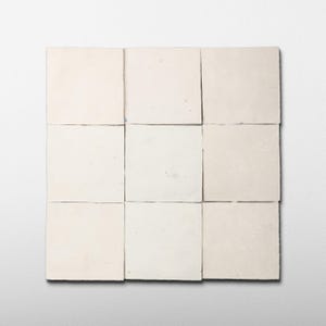 May include: A grid of nine square off-white tiles arranged in a three-by-three pattern. Each tile features a smooth, matte surface with subtle variations in tone and texture, creating a uniform appearance across the entire square assembly.