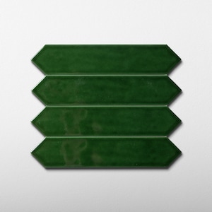 May include: Four dark green ceramic tiles arranged in a horizontal stack. Each tile has a glossy finish and a unique elongated shape with pointed ends, resembling an arrow. The tiles are set against a plain white background.