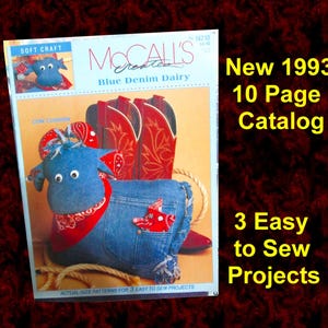May include: A 1993 McCall's craft pattern catalog titled Blue Denim Dairy featuring a blue denim cow plush with a red bandana and red cowboy boots. The cover displays 10 pages of instructions for 3 easy to sew projects with text New 1993 10 Page Catalog.