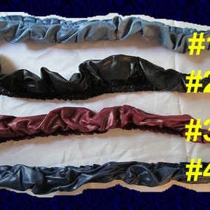 May include: Four different fabric strips, each with a different color and texture. The strips are numbered 1 through 4. The colors are blue, black, burgundy, and dark blue.