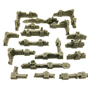 May include: A collection of gray, modular terrain pieces for tabletop gaming. The pieces include various wall sections, corners, and structures, all with a weathered, stone-like texture. Ideal for creating detailed battlefields.