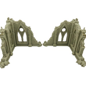 May include: Two beige, L-shaped miniature wall sections featuring gothic-style architecture with pointed arches, circular window cutouts, and jagged, broken edges that simulate a ruined building structure for tabletop gaming.