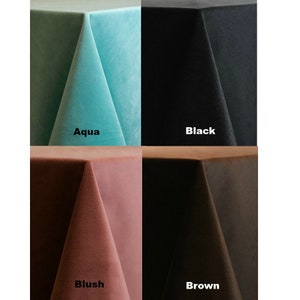 May include: Four velvet tablecloths in different colors: aqua, black, blush, and brown. The tablecloths are folded in half and laid out on a white background.