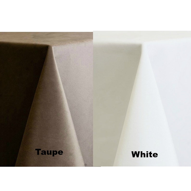 May include: Two tablecloths, one taupe and one white, are shown on a table. The tablecloths are made of a smooth, silky fabric.