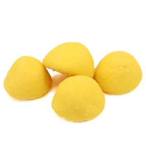May include: Four yellow, cone-shaped sweets with a sugared coating are arranged on a white background. The sweets have a slightly rough texture and a bright colour, suggesting a sugary treat.