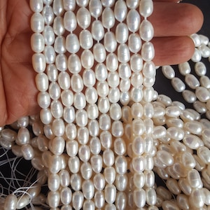 Newly Listed ~~~ Natural Fresh Water Pearls ---- 6 mm -Rice Pearls~~~~ Fancy Shape ~~~1 Strand~~~ 14 inches ~~~~45 Beads in 1 strand