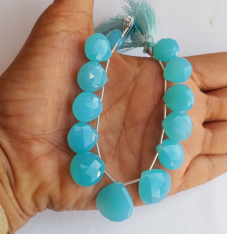 Newly Listed ~~~ Blue Chalcedony Briolette Beads ~~~1 Strand~~143 carat~~ Heart Shape~~~ 13 Pieces~~~Side Drilled~~12-17 MM~~