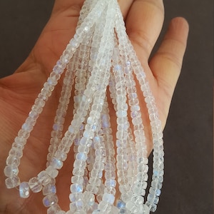 Newly Listed ~~~ Natural White Rainbow ~~ faceted rondelle ~~~ Flashy Blue ~~~ 4.5-6 MM ~~~ 8 inches ~~~~~ AAA Quality