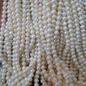 Newly  Listed---- Natural Fresh Water Pearl---Smooth Rondelle Shape Pearl---4 mm----5 inches long----AAA Quality