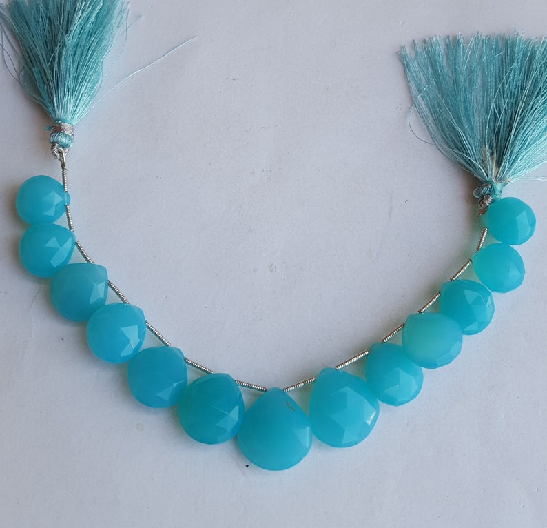 Newly Listed ~~~ Blue Chalcedony Briolette Beads ~~~1 Strand~~143 carat~~ Heart Shape~~~ 13 Pieces~~~Side Drilled~~12-17 MM~~