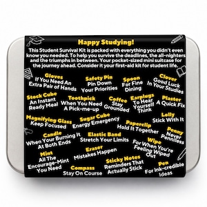 May include: A rectangular silver metal tin with a black label featuring the text Happy Studying! and a list of items including gloves, safety pin, spoon, clover, stock cube, toothpick, coffee, earplugs, plaster, magnifying glass, sugar cube, paperclip, lolly, candle, elastic band, wipe, penny, mint, eraser, sticky notes, compass, and pen.