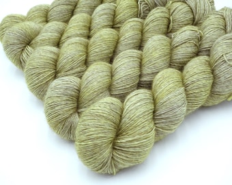 Chaff // Yakima Fingering, merino silk and yak blend singles fingering in a pale wheat color. 120 gm oversized skeins.