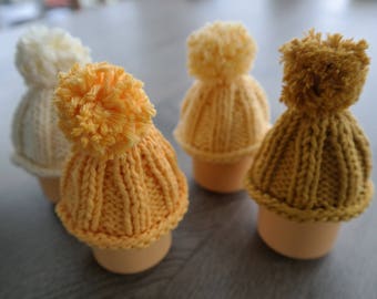 Set of 4 knitted "bobble hat" egg warmers