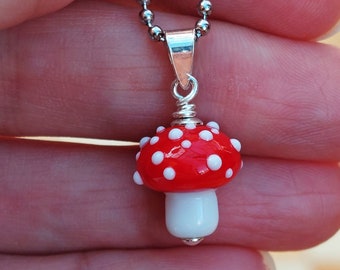 handmade lampwork glass pendant charm small mushroom toadstool autumn woods forest fairytale red white dots glass bead charm glass jewelry