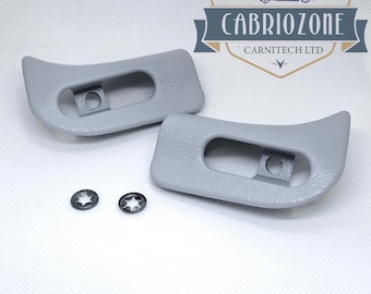 May include: Two gray plastic car window trim pieces with two star-shaped screws. Cabriozone Carnitech LTD.