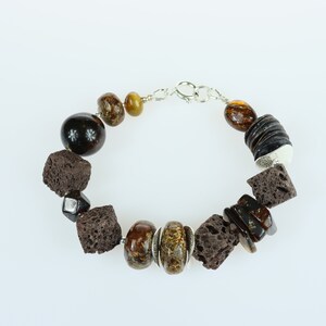 bracelet   sterling silver + resin + matte black shell Heishi + lava