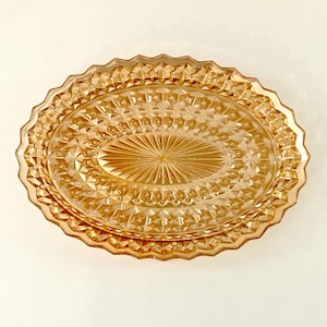 Vintage Marigold Carnival Glass Oval Dish or Platter, Iridescent Scalloped Pointed Edge, made by Jeannette Glass in the USA in the 1940s