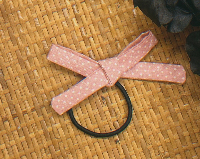 blush pink and white polka dot print skinny bow hair elastic