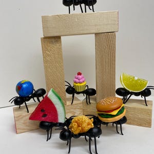 Fake ants and watermelon tiered tray, world, hamburger cupcake, lemon, hotdog and fried chicken Tiered tray . Spring Summer Picnic.