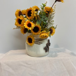 Mini sunflowers with dragonfly in painted mason jar. Farmhouse house bedroom, bathroom, kitchen centerpiece