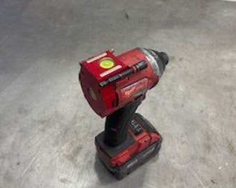 Milwaukee M18 Fuel Drill combo level attachment with speed selection slide snap on for quick attachment bubble level.