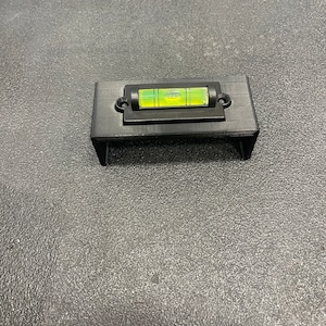 Milwaukee M18 band saw level battery adapter