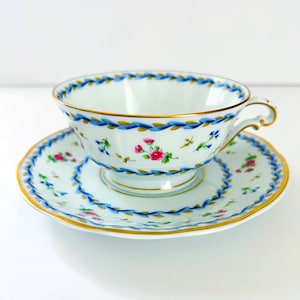 1 “Artois Bleu” Teacup and Saucer Set By Bernardaud Limoges, 1990s