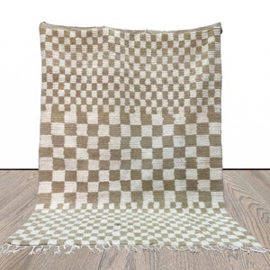 Checkered Beige and white area rug.