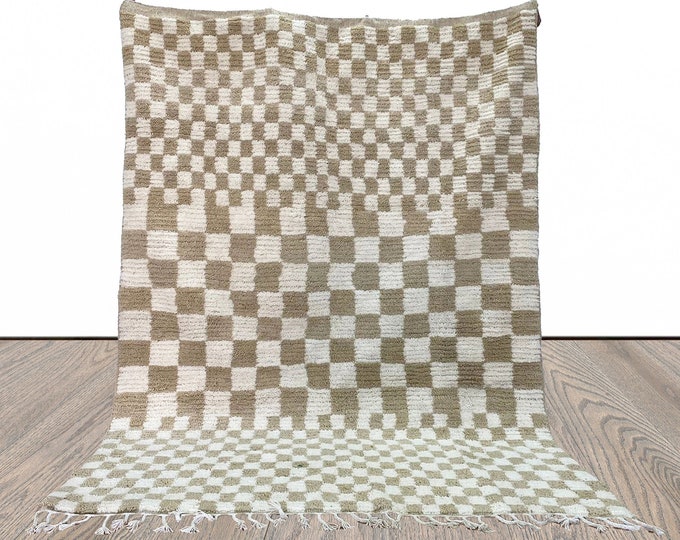 Checkered Beige and white area rug.