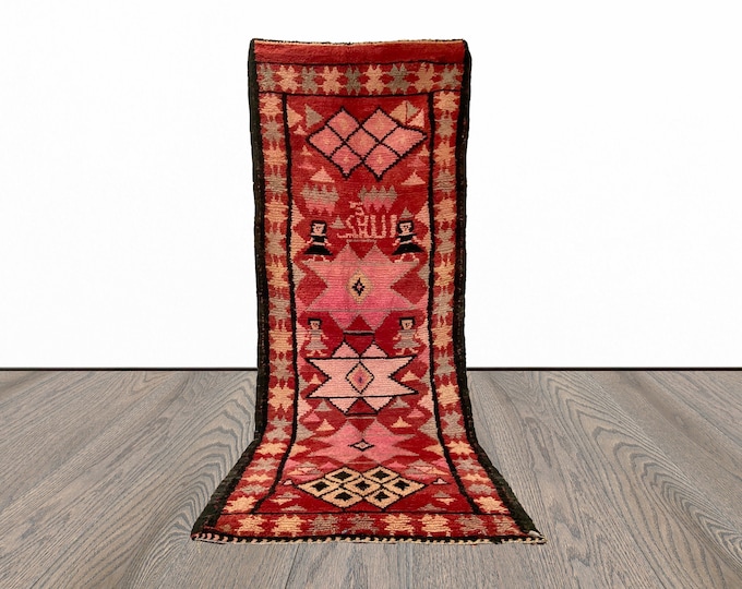 Narrow Moroccan vintage 4x12 runner rug.