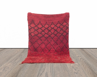 3x5 ft small Moroccan red shaggy rug.