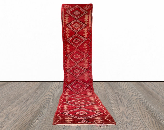 Long Moroccan red 3x14 runner rug.