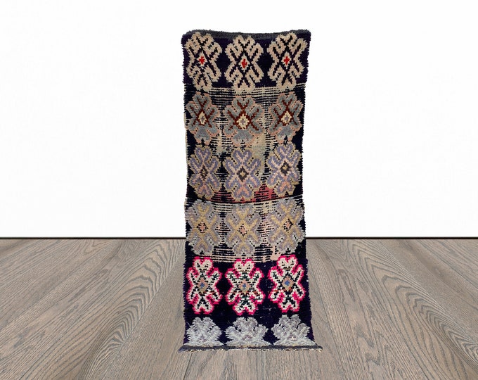 Berber Moroccan faded 2x7 runner rug.
