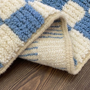 Light blue and white Moroccan checkered rug: wool checkerboard rugs.