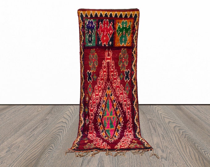 Moroccan narrow abstract 3x8 runner rug.