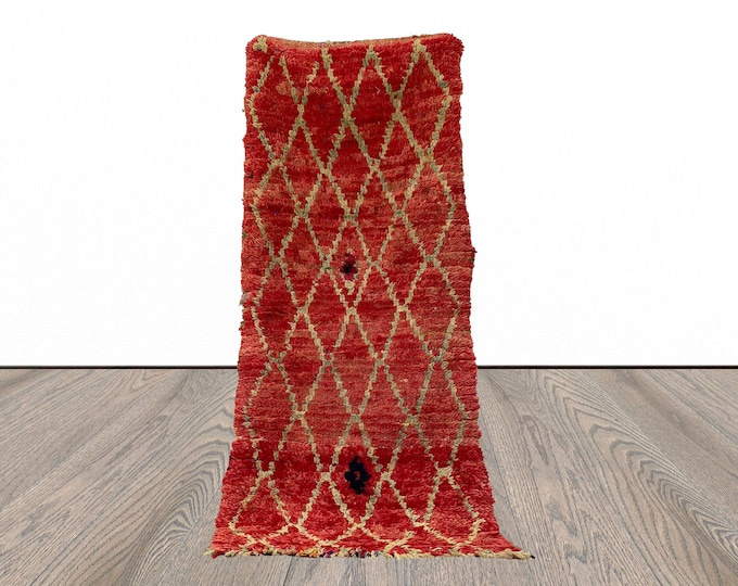 3x7 wool woven diamond Moroccan runner rug.