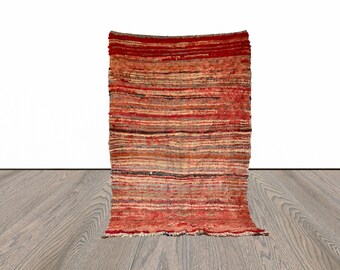 4x7 ft Moroccan Berber worn rug.