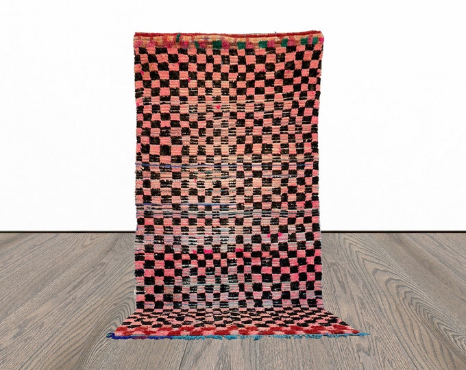 Moroccan checkered colorful 4x8 rug.
