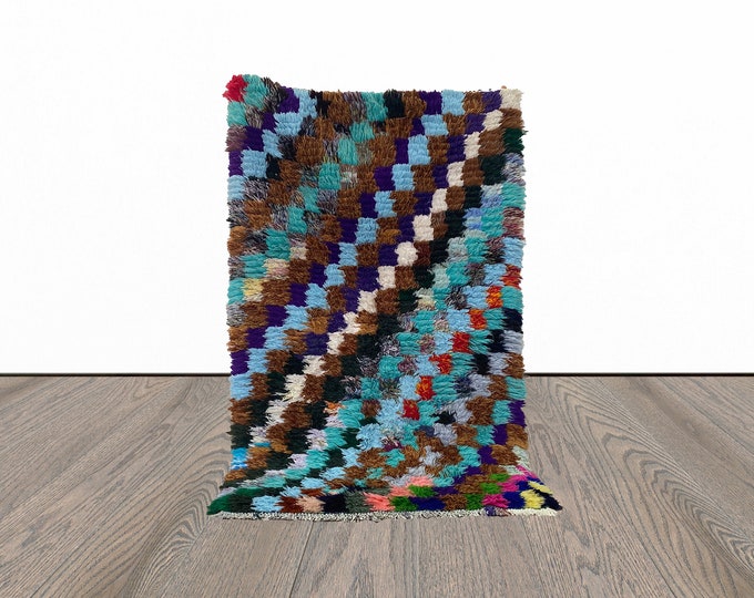 Small colorful checker area 3x5 rug.