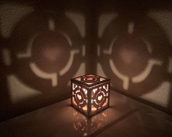 Companion Cube: Tea lightbox candle holder.