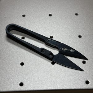 May include: A handmade wooden sign with the text "Welcome to our home" in a handwritten style. The sign is painted white with black lettering and a distressed finish, perfect for indoor or outdoor use.