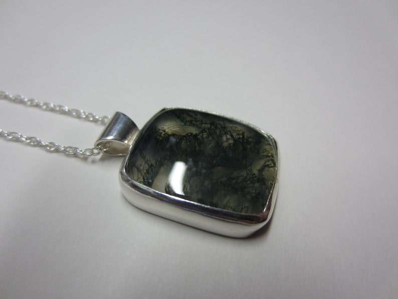 moss agate pendant set in sterling silver