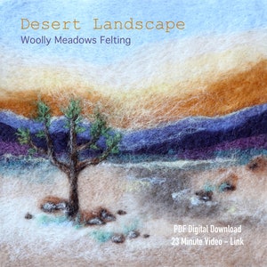 May include: A felted artwork showing a desert scene with a tree. The sky blends from orange to blue, with purple mountains in the background. The text "Desert Landscape" and "Woolly Meadows Felting" are at the top of the image.