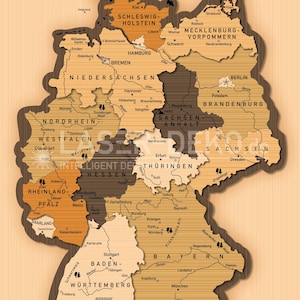 May include: Wooden map of Germany with each state outlined and labeled. The map is in shades of brown and tan, with the text "Bundesrepublik Deutschland" at the top and "Example View" at the bottom.