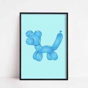 May include: A framed print featuring a blue balloon dog illustration against a light blue background. The artwork is encased in a black frame, creating a clean and modern aesthetic. The balloon dog is a whimsical design.