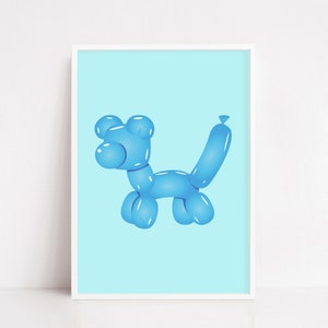May include: A framed print featuring a blue balloon dog illustration against a light blue background. The dog is rendered in a 3D style, with highlights and shadows. The artwork is displayed in a white frame, suitable for children's rooms or nurseries.
