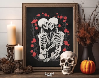 May include: A framed wall art print featuring two skeletons facing each other, surrounded by red roses on a black background. The print is labelled Green Wood Printables at the bottom. The frame is brown and has a textured, ornate border design.