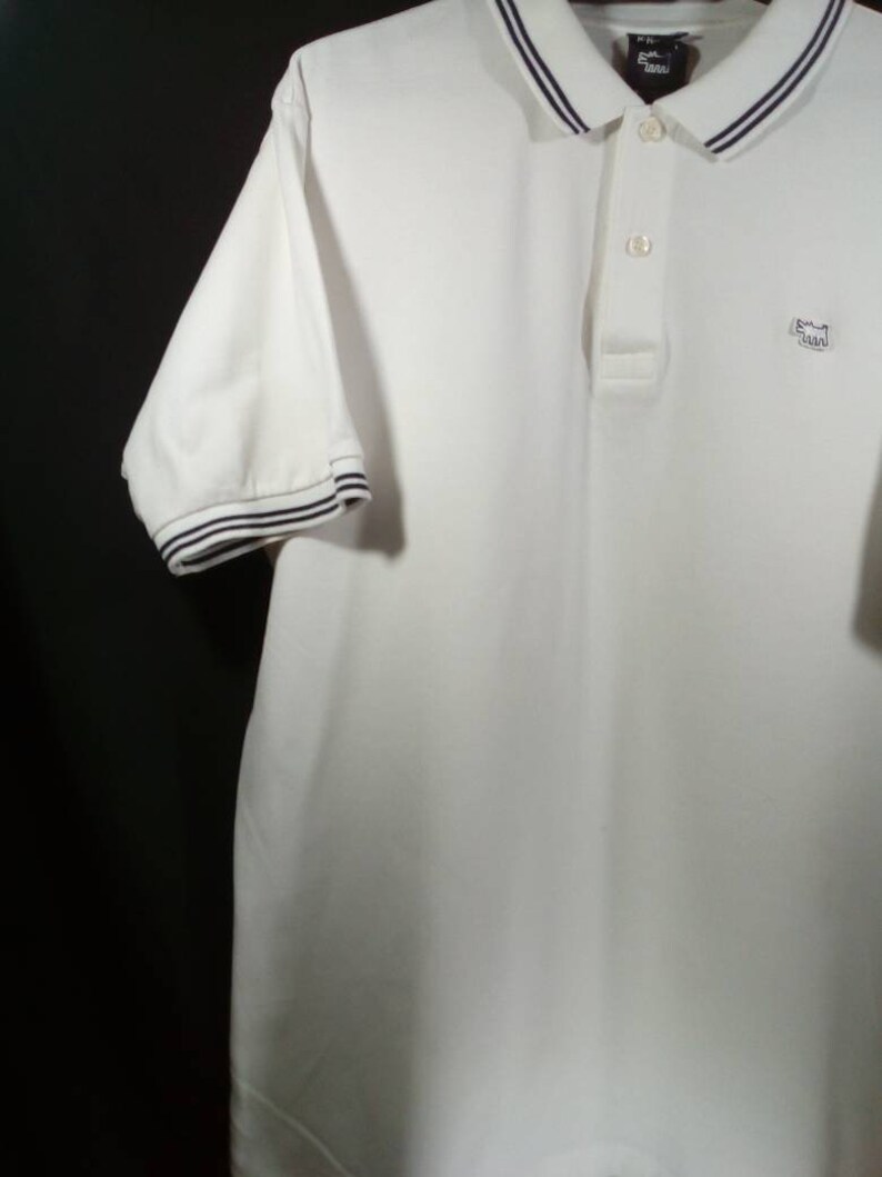 Vintage Keith Haring X uniqlo polo tee