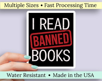 May include: Black and white sticker with the text "I READ BANNED BOOKS" in white lettering. The word "BANNED" is in a red rectangle with a distressed look.